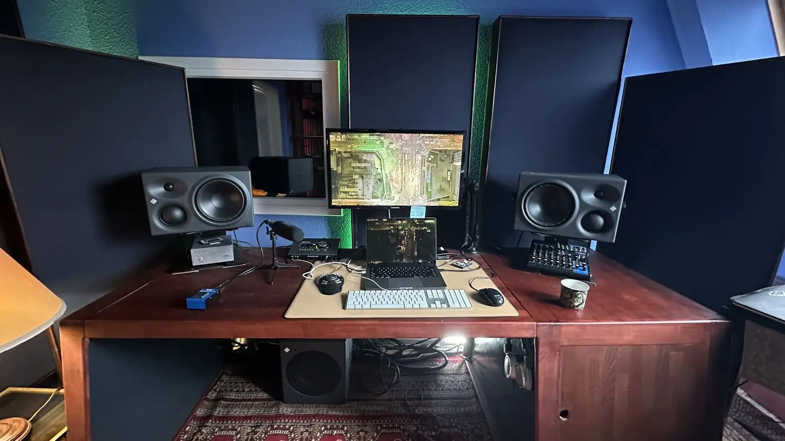 The working position at the desk, monitors and keyboard