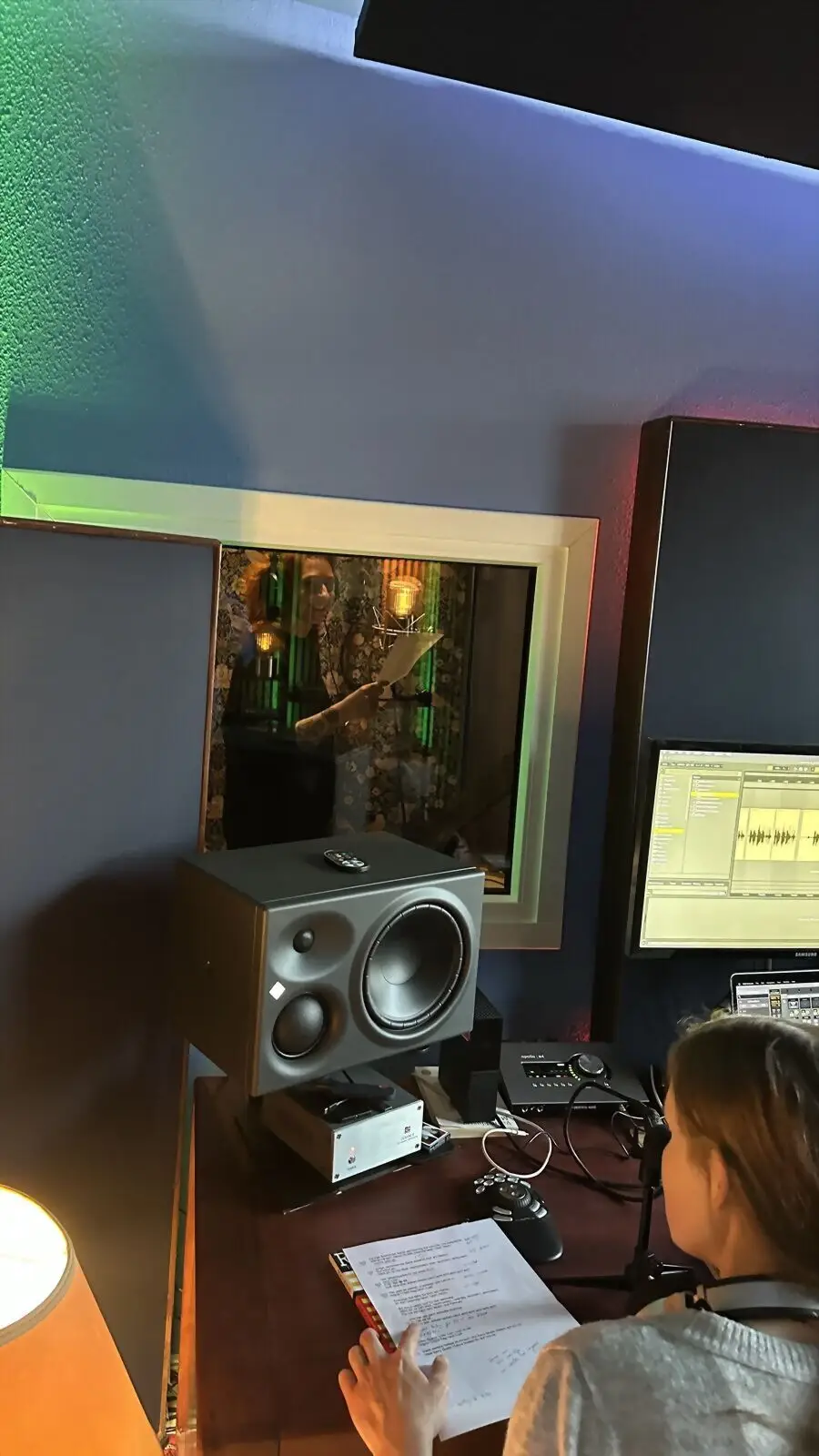 Over the shoulder at the monitors while working